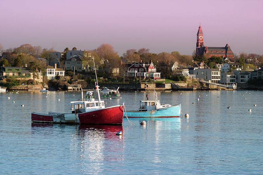 Marblehead harbor at golden hour with fishing boats and lobster traps